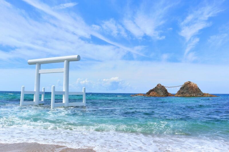 white torii gate in Futamigaura Beach